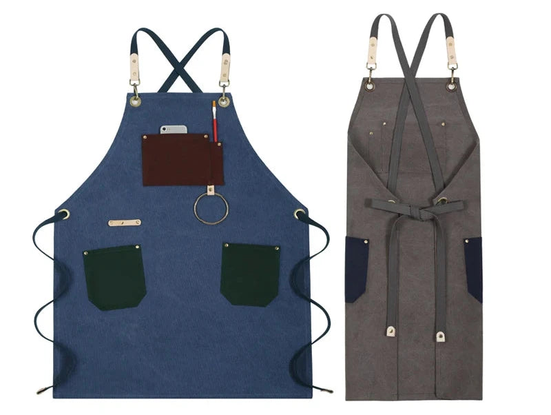 Blue and gray aprons with various pockets and straps on a white background