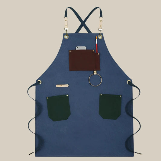 Blue apron with pockets and attachments on a grey background,